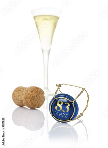 Fotografia Champagnerdeckel mit der Aufschrift 83 Jahre