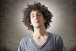 © sebra - Portrait of young curly man face with eyes closed