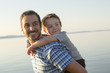 © Louis-Photo - Father with is son at the sunset