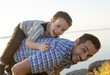 © Louis-Paul Photo - Father with is son at the sunset