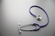 © rogerphoto - Stethoscope on the grey desk, close up