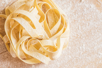 Dry pasta nest on a table