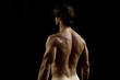© curto - studio photography of a man with His back,