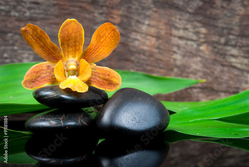 Naklejka na szybę spa concept zen stones and orchid,wood background
