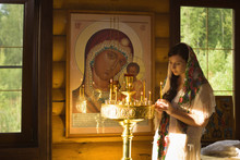 Russian Woman Praying In Church