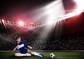 Wall Mural - Young soccer player