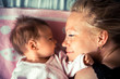 © splendens - Newborn with mother looking at each other symbolizing love and child care