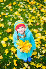 Canvas Print - Little girl outdoors on autumn day