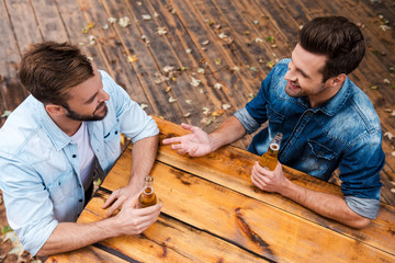 Wall Mural - Enjoying beer with friend.