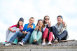© Syda Productions - group of teenagers showing finger five