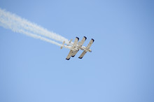 Three Very Close Aerobatic Stands Planes Smoke Tails