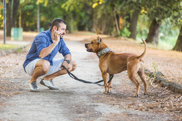 Man with his dog at park