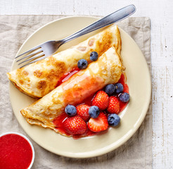 Wall Mural - crepes with fresh berries