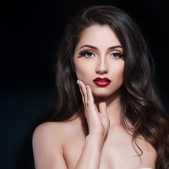 Wall Mural - Beautiful woman with evening make-up. Jewelry and Beauty. Fashion photo