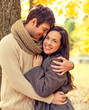 © Syda Productions - smiling couple hugging in autumn park