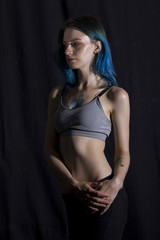 Wall Mural - Blue haired girl pose in studio