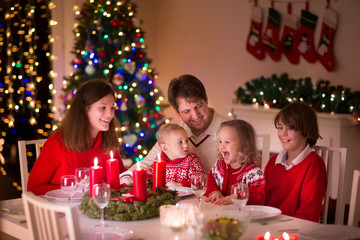 Wall Mural - Family enjoying Christmas dinner at home