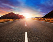 © stockphoto mania - beautiful sun rising sky with asphalt highways road in rural sce