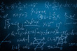 © christianchan - Maths formulas on chalkboard background