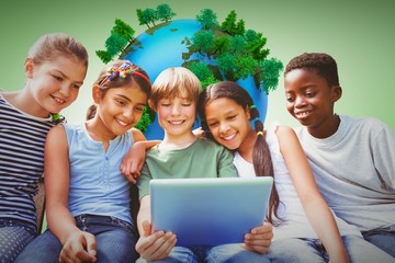 Sticker - Composite image of happy children using digital tablet at park