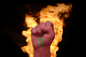 fire fist with the national flag of morocco