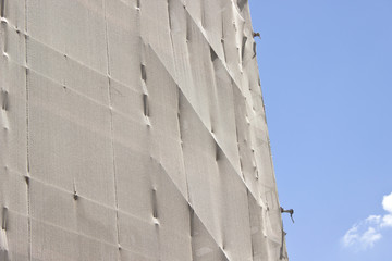 Building construction - scaffolding with linen protection over s