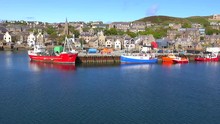 Establishing Shot From A Boat Of The Port At Stromness, Orkney Islands, Scotland.