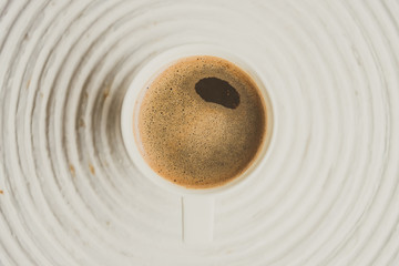 Wall Mural - Selective focus point on black coffee in white cup - vintage fil