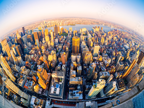 Fotografía Aerial view of New York City at sunset