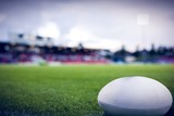Fototapeta Sport - Composite image of rugby ball