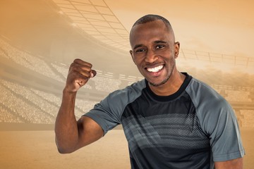 Canvas Print - Composite image of portrait of sportsman cheering