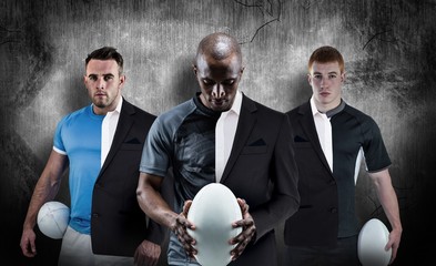 Poster - Composite image of rugby player holding a rugby ball