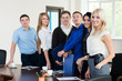 © kanzefar - The team of young successful business people in the office of st