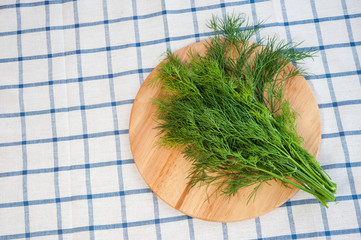 fresh dill on a cutting board