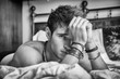 © theartofphoto - Shirtless sexy male model lying alone on his bed