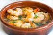 Gambas Pil Pil (Sizzling prawns with chili and garlic). Traditional Spanish tapas dish.