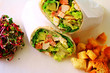 © monkee_leelu - healthy wrap chicken and lettuce with salad and croutons on a side shot from above close-up and cropped landscape