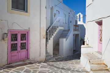 Naklejka na meble Street with traditional architecture in the old part of Parikia which is the capital and main port of Paros island in Greece.
