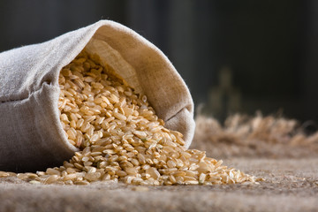 brown rice in small linen sack