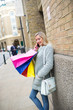 A beautiful woman with shopping bags in shopping street, London