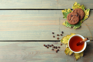 tea and cookies on wooden background