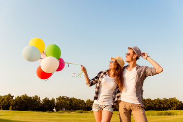 Sticker - couple in love walking with balloons