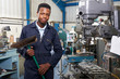 Apprentice In Engineering Factory Sweeping Floor