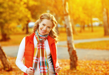 Sticker - happy girl with autumn leaves on walk