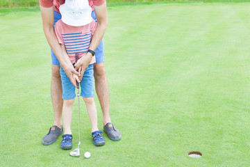 Canvas Print - boy playing golf