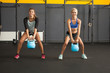 © Tom Kuest - kettlebell fitness training woman