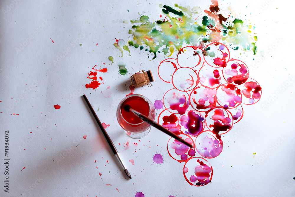 Grapes painted with wine, cork and paints on paper background