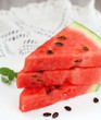 Slices of watermelon on the white plate