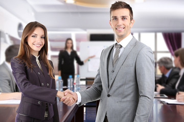 Wall Mural - Business colleagues shaking hands and business people