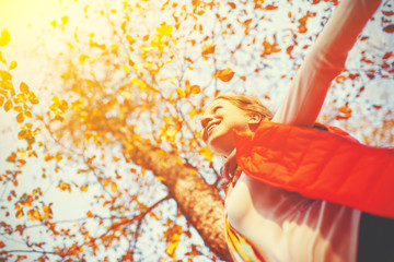 Wall Mural - happy girl enjoying life and freedom in autumn on nature